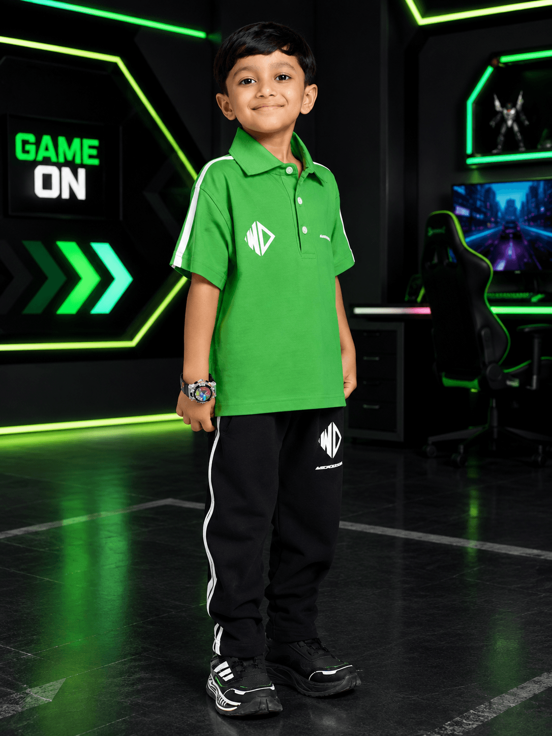 CHAMPION TRACK POLO CO-ORD FOR BOYS GIRLS GREEN BLACK worn by a boy in a modern gaming setup.