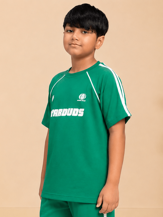 KIDS ROSTER T-SHIRT BOYS GIRLS GREEN WHITE worn by a boy, featuring a vibrant green color and sporty design.