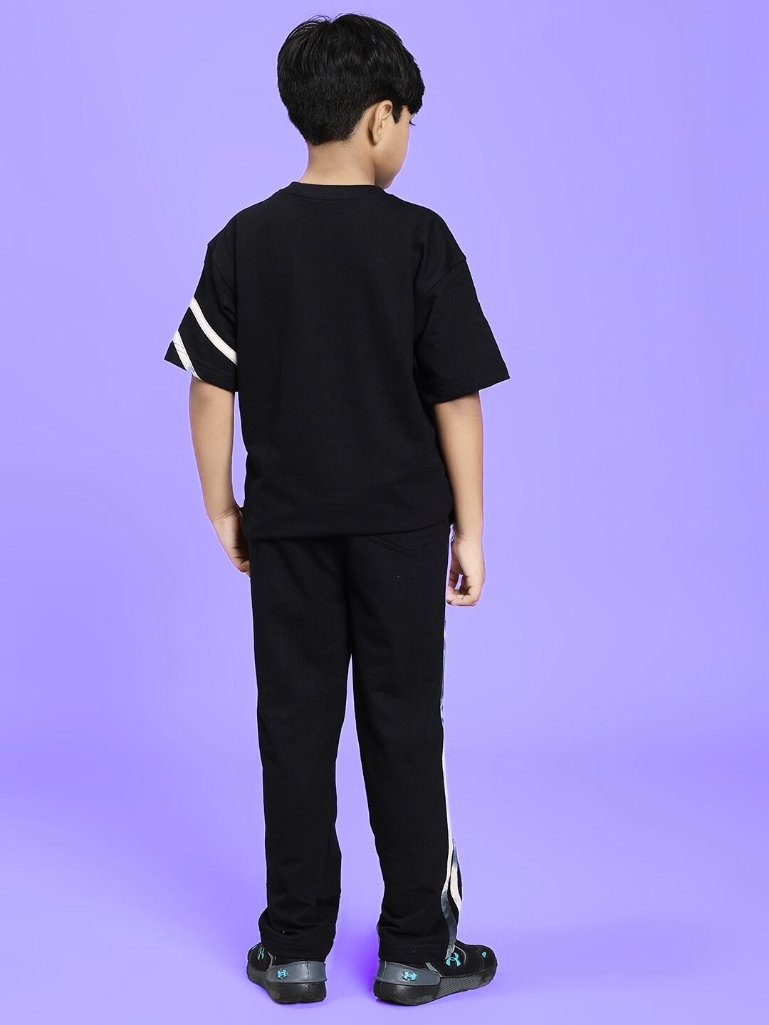 Child wearing FLICKER DESIGNER CO-ORD SET FOR BOYS GIRLS BLACK, stylish black outfit for kids.