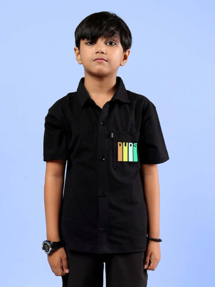 Child wearing a black FOREVER GAMER shirt, designed for boys and girls. Custom fit available, made by skilled tailors.