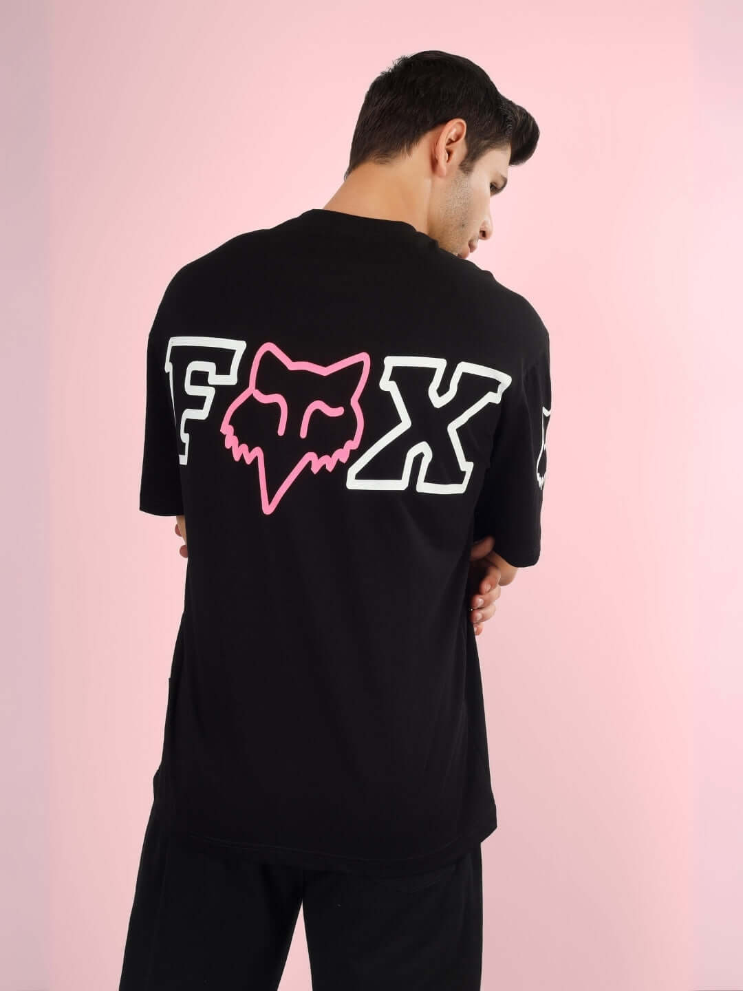 Black FOX oversized t-shirt with pink logo on back, custom fit option available, handmade for personalized style.