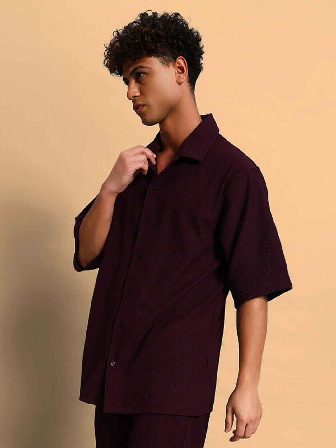 Model wearing FROWZY solid wine shirt with half sleeves, featuring 4-way stretch and wrinkle-free fabric, perfect for all-day comfort.