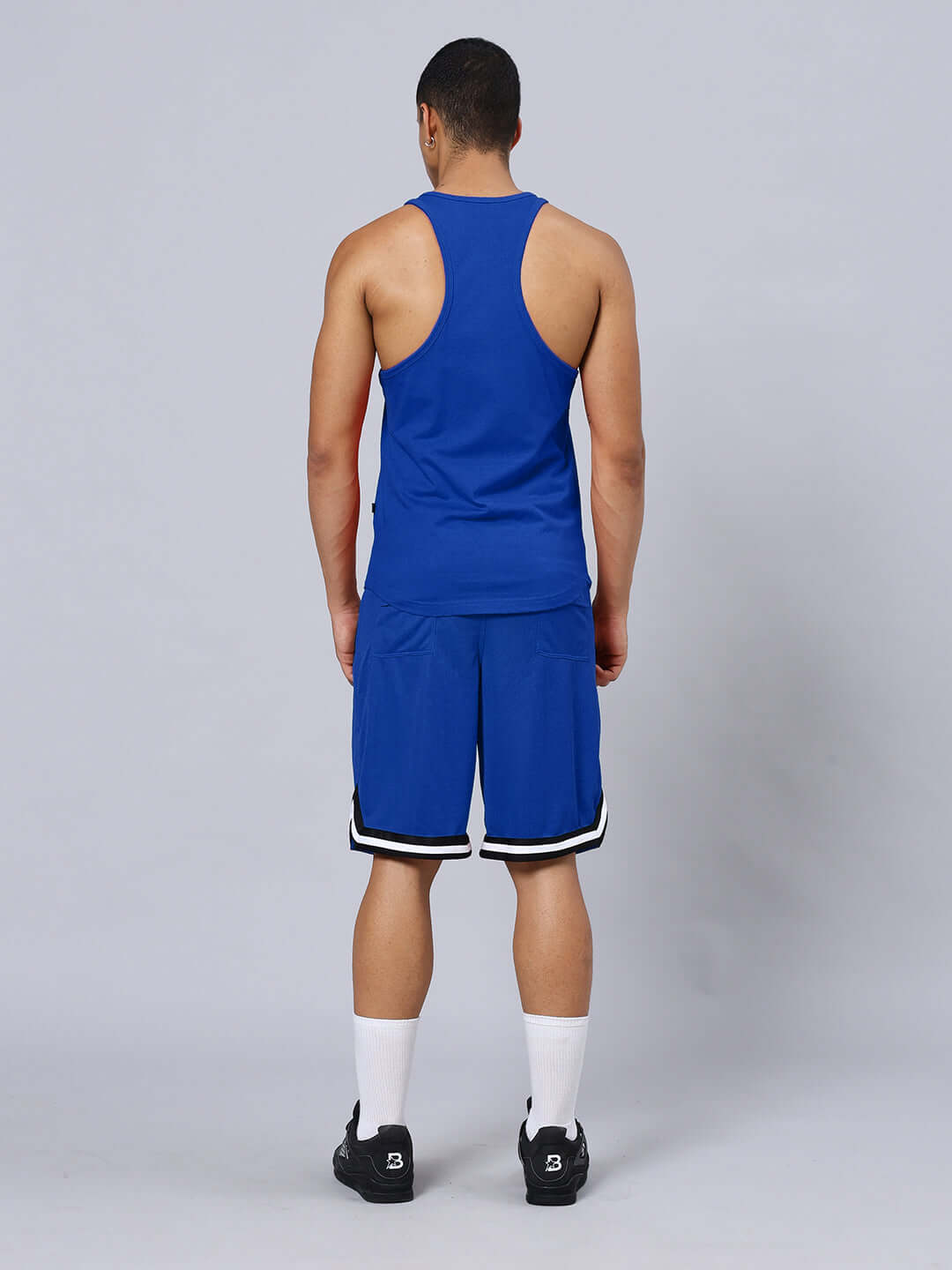 Back view of FEARLESS PRINTED GYM CO-ORD SET BLUE showcasing athletic fit and style.