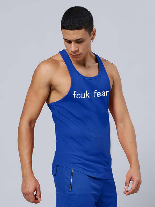 Blue gym t-shirt with 'FUCK FEAR' print, featuring a sleeveless design and customizable fit options from DUDS.
