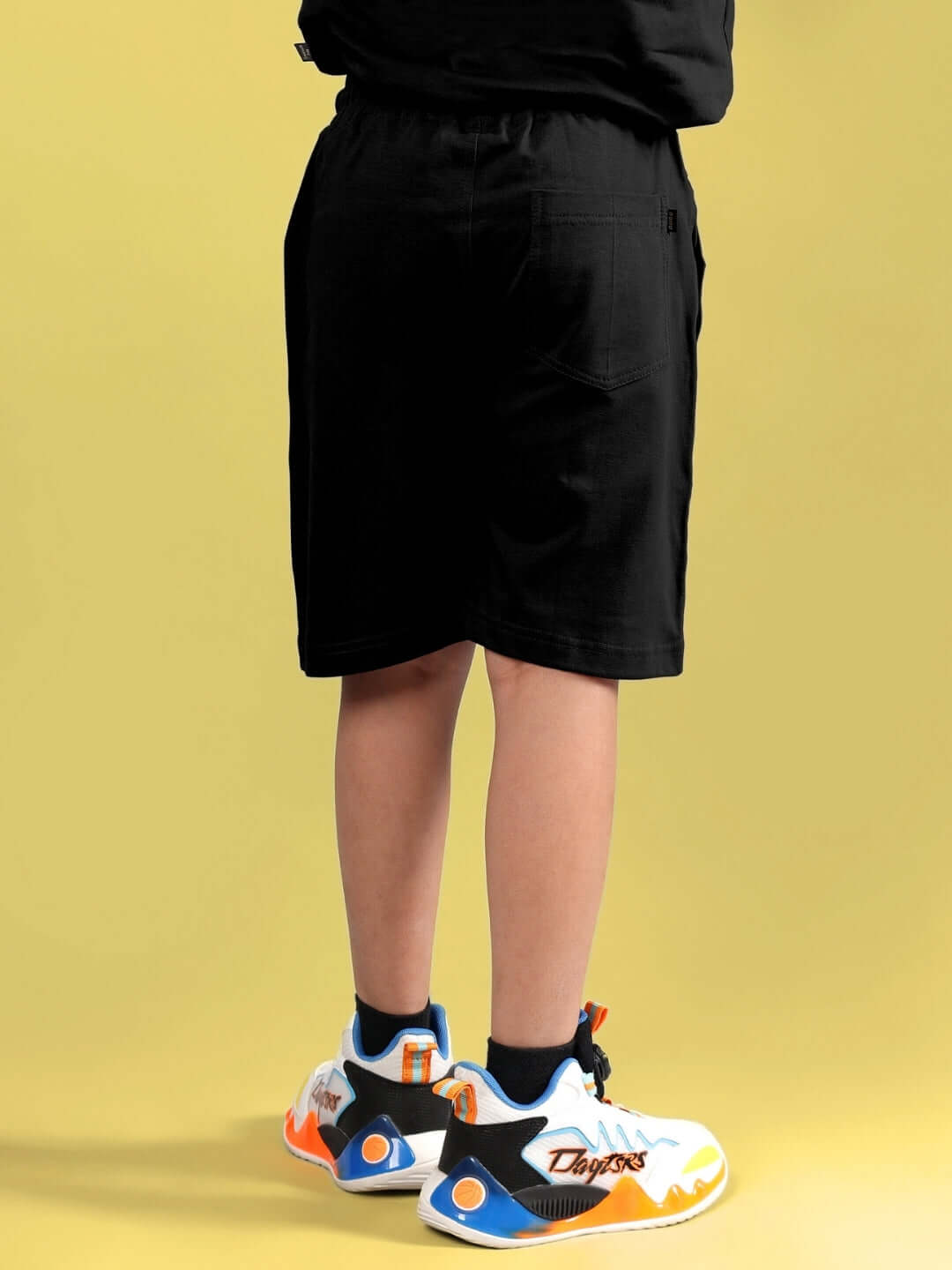 Back view of FUNNY CHICKEN PRINTED SHORTS FOR BOYS & GIRLS BLACK, made by skilled tailors, ideal for casual wear.