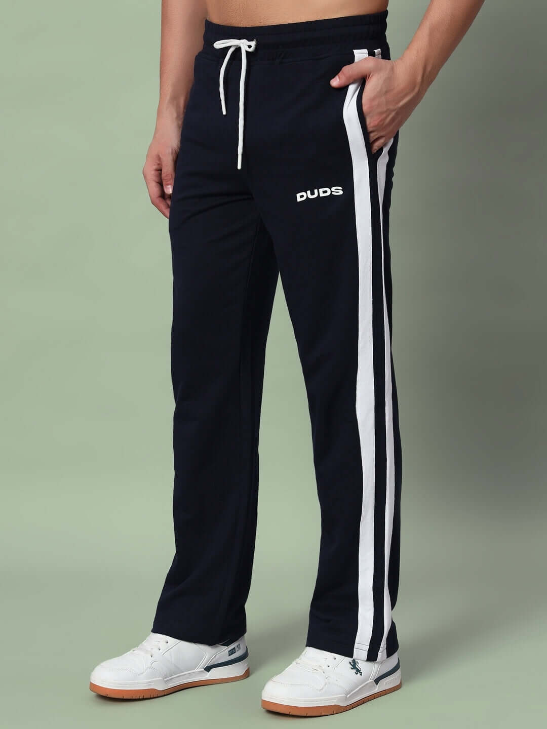 Model wearing black Future Icon 2 Stripe Jogger by DUDS with white stripes, showcasing customizable and tailored fit options.