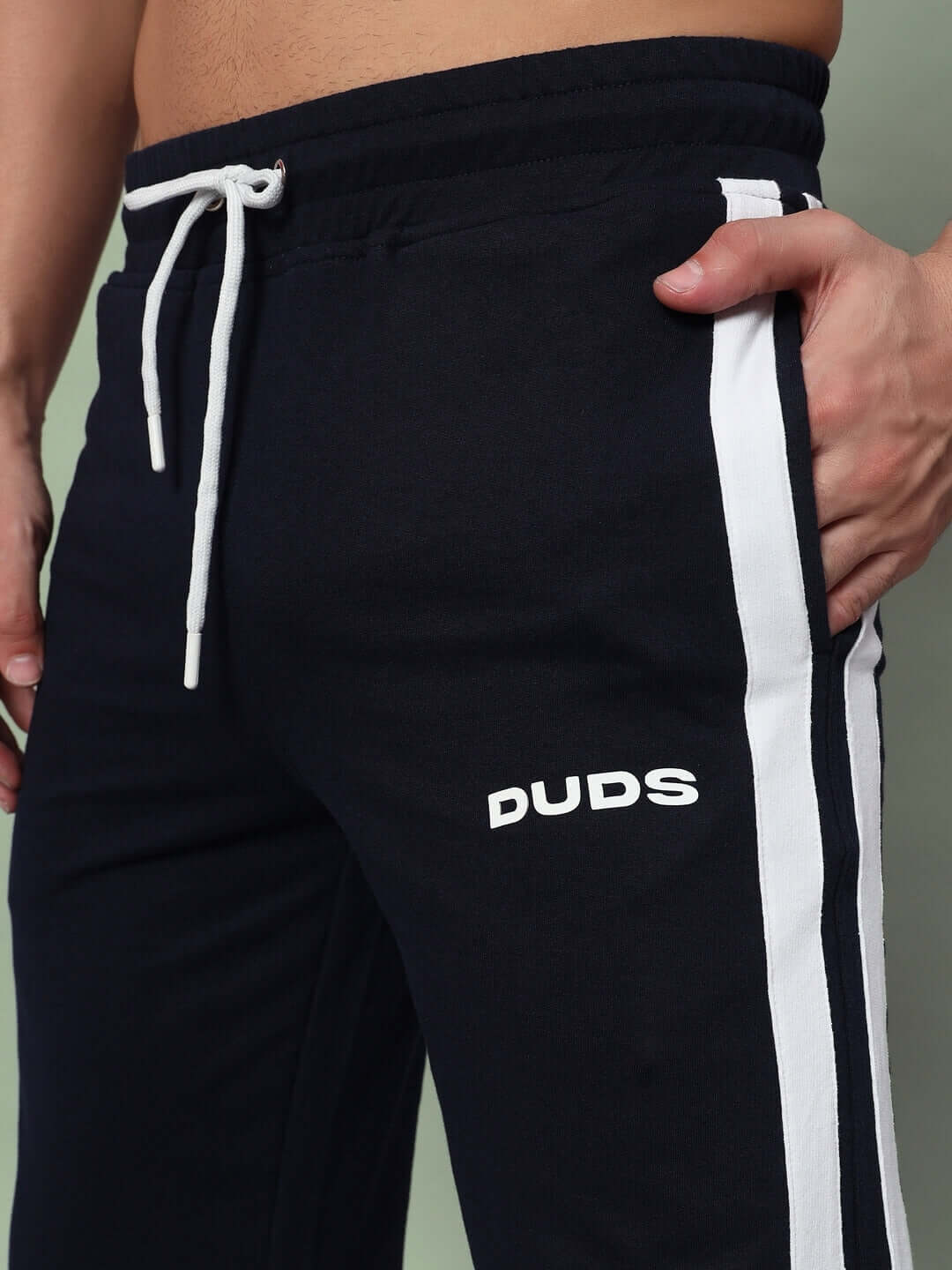 Close-up of DUDS FUTURE ICON 2 Stripe Jogger in black with white side stripes and adjustable drawstring.