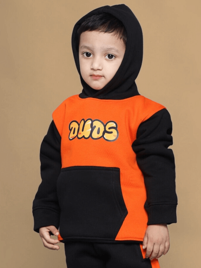 Child wearing a Garfield oversized hoodie for boys and girls in orange-black color, front view