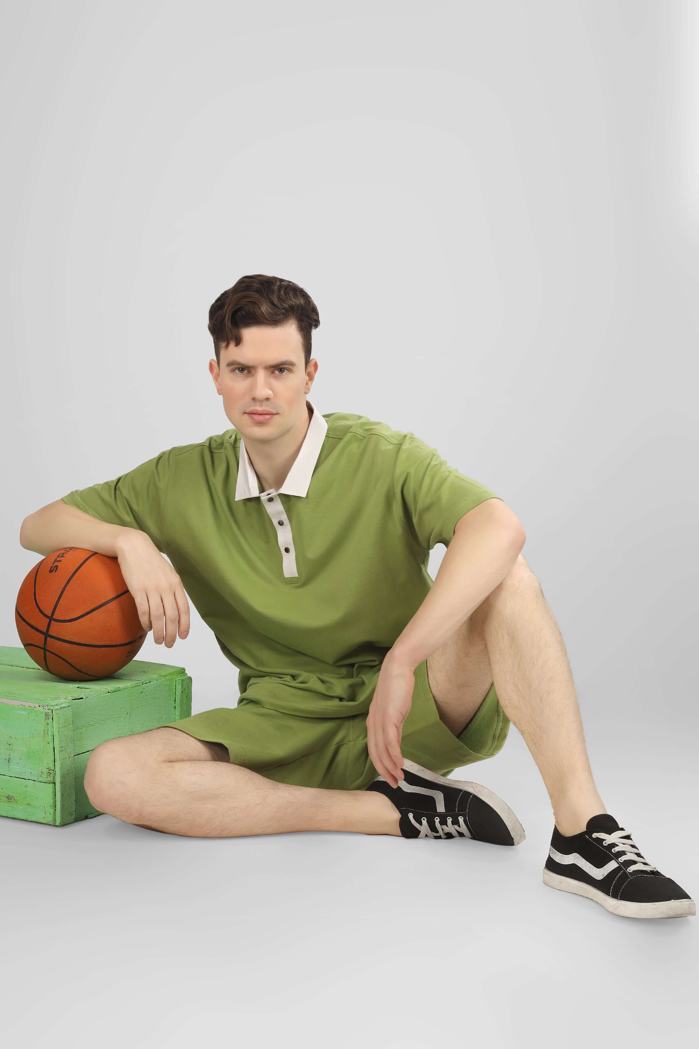Male model wearing GLAZY CO-ORD Set in pista green, showcasing relaxed fit and premium cotton fabric, ideal for casual style and comfort.
