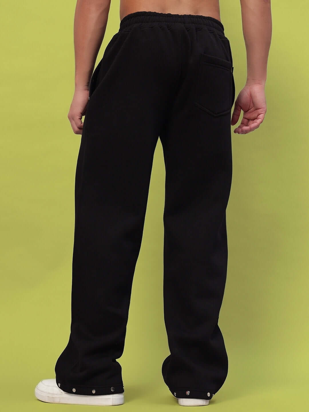 Men's Global Cotton Fleece Jogger in black, rear view, featuring comfortable fit and elastic waistband.