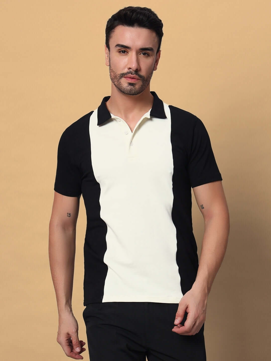 Model wearing GLORY Regular Fit T-shirt in black-off white, made from premium cotton French Terry Lycra, bio-washed, 240 GSM.