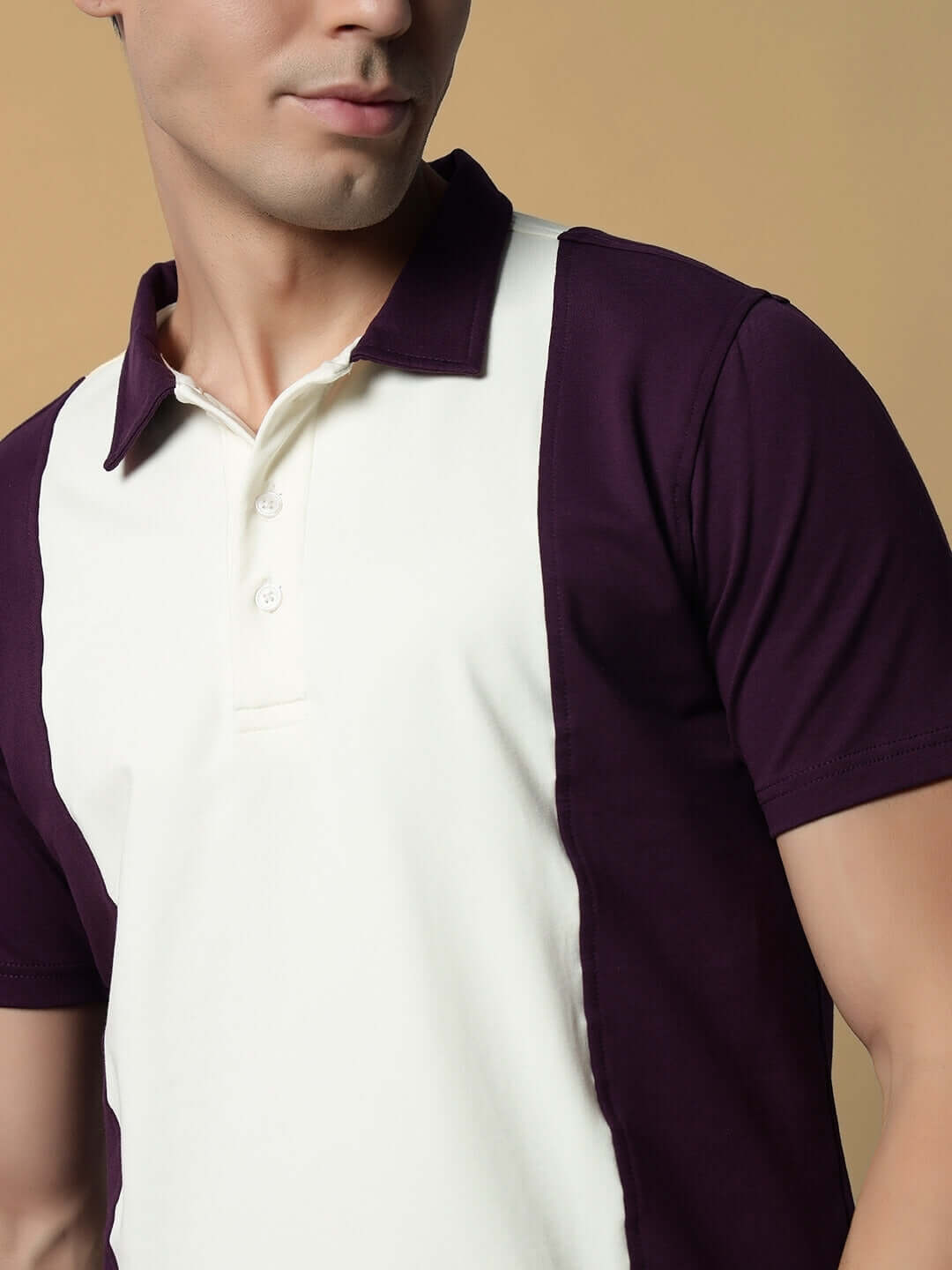 Man wearing GLORY REGULAR FIT T-SHIRT PURPLE-OFF WHITE, featuring a colorblock design with soft purple and off-white, ideal for casual wear.