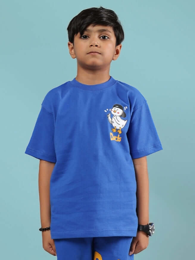Boy wearing GO MOTION T-SHIRT FOR BOYS & GIRLS ROYAL BLUE with unique design, made to order, customize size available.