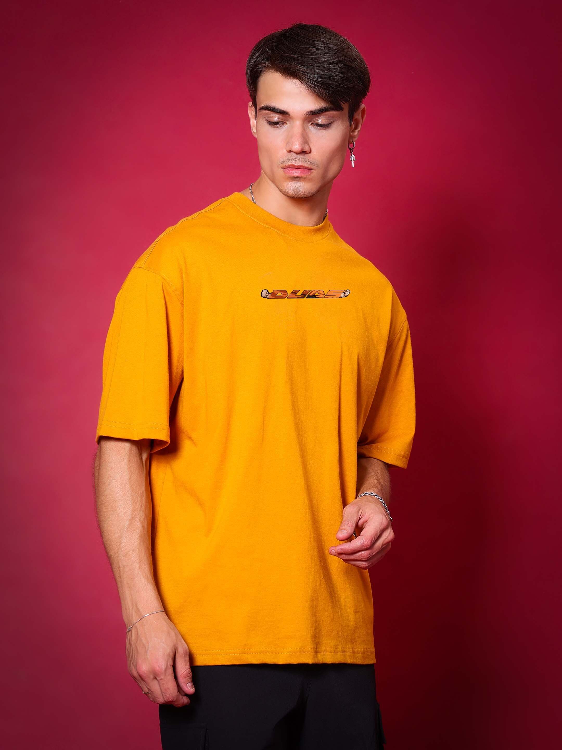 Model wearing Gohan over-sized mustard t-shirt, ideal for casual fashion and customizable fit.