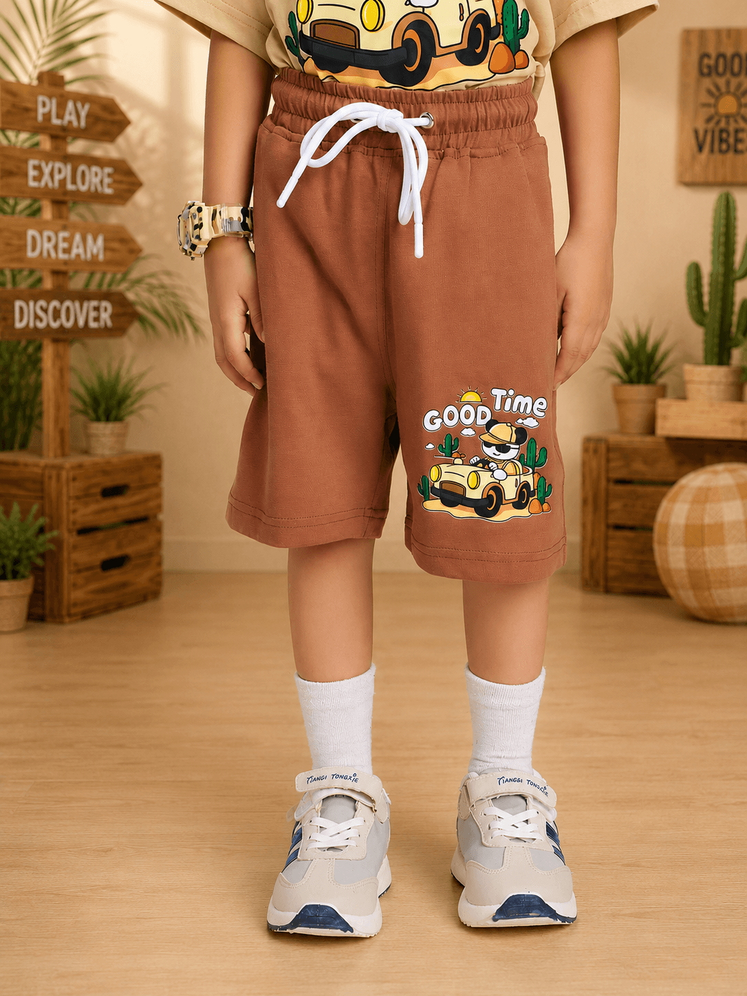 GOOD TIME PRINT CO-ORD FOR BOYS GIRLS BEIGE BROWN featuring stylish shorts and playful cartoon graphics.