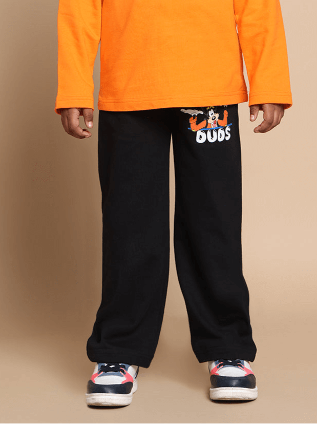 Child wearing black Goofy Joggers by DUDS, available for boys and girls, featuring playful design for comfort and style.