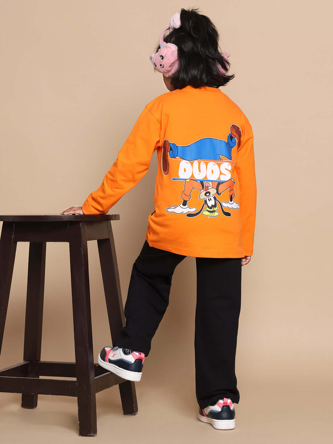 Unisex orange and black co-ord set for kids featuring cartoon design, relaxed fit, elastic waistband, premium cotton blend.