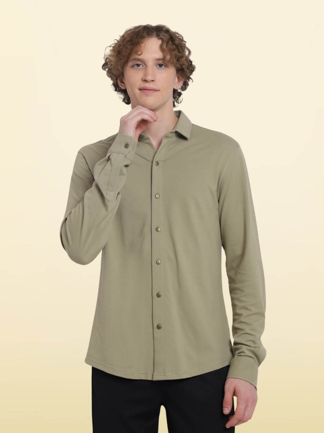Model in a full sleeve, slim fit GRAVEL SPORTY PIQUE SHIRT, showcasing its wrinkle-free, superior stretch, sporty pique fabric.