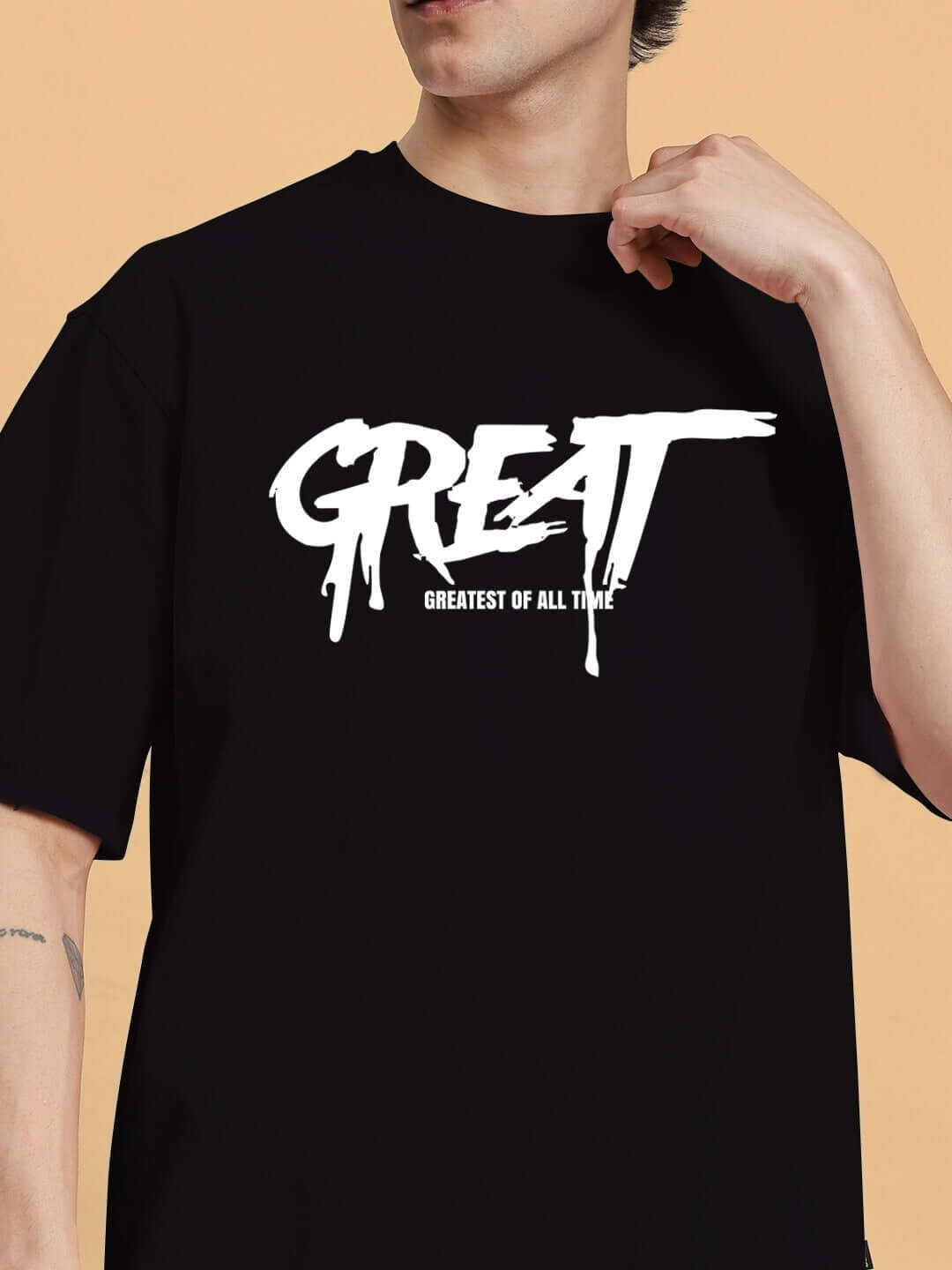 Man wearing black t-shirt with 'GREAT' design, part of the GREAT PRINTED SUMMER CO-ORD SET BLACK.