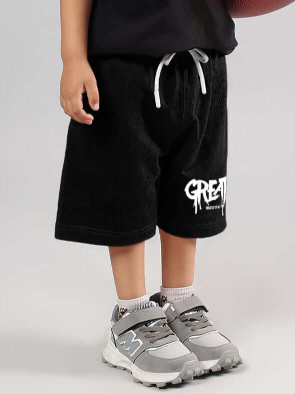 Black summer shorts for boys and girls with printed design, customizable fit by DUDS.