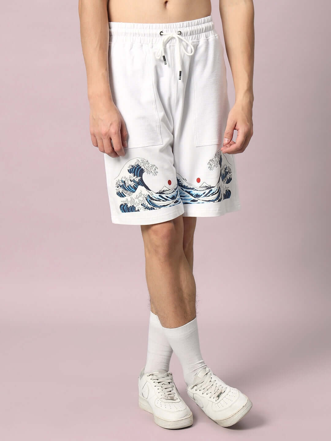 Model wearing The Great Wave printed white co-ord set, featuring ocean wave design shorts, made with premium cotton terry fabric.