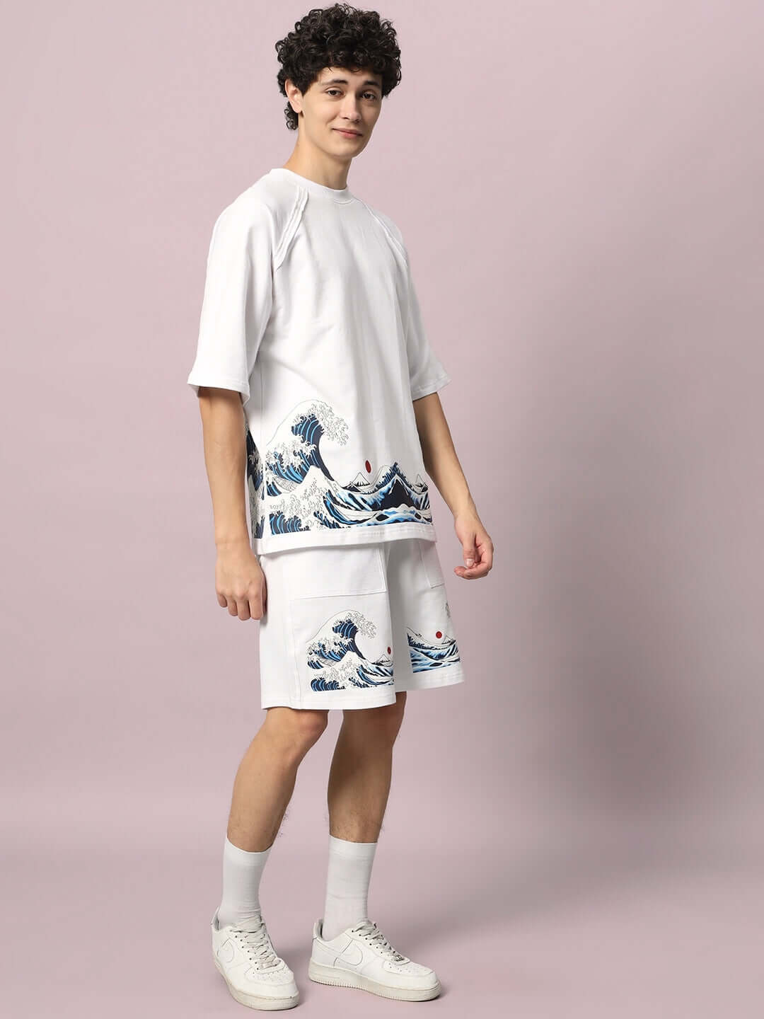 Model wearing white co-ord set with 'The Great Wave' print, featuring premium cotton fabric; stylish and comfortable.
