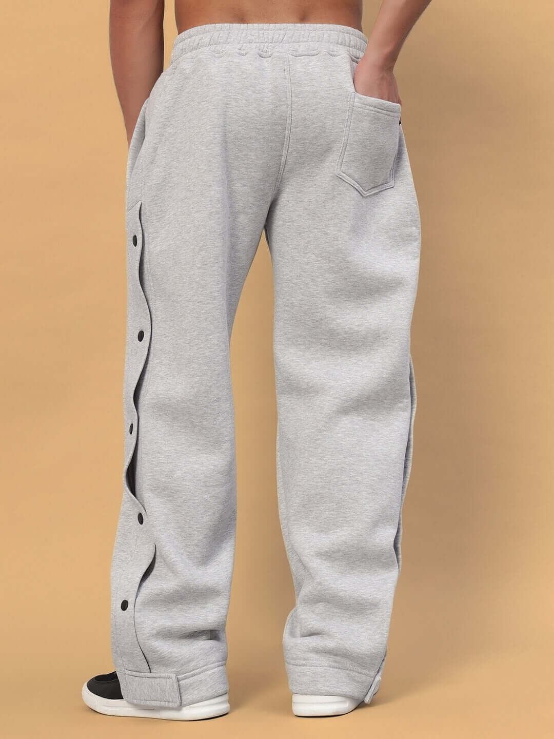 Back view of grey Polar Cotton Fleece Jogger showcasing side button detailing and pocket, perfect for comfortable casual wear.