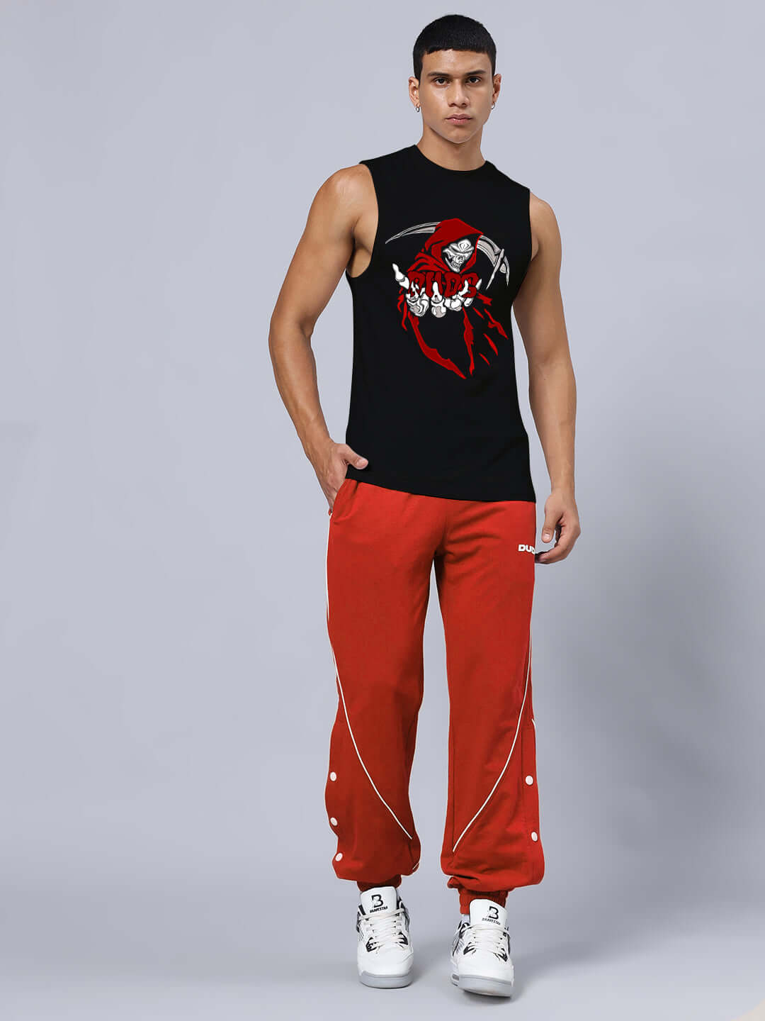 GRIM REAPER PRINTED GYM RELAXED FIT CO-ORD SET BLACK-RED with unisex joggers and sleeveless top on model.