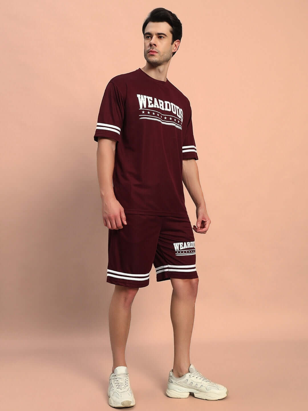 Model wearing GROOVY COLORBLOCK CO-ORD SET WINE from WEAR DUDS, showcasing bold streetwear design with retro-inspired colors in cotton-blend.