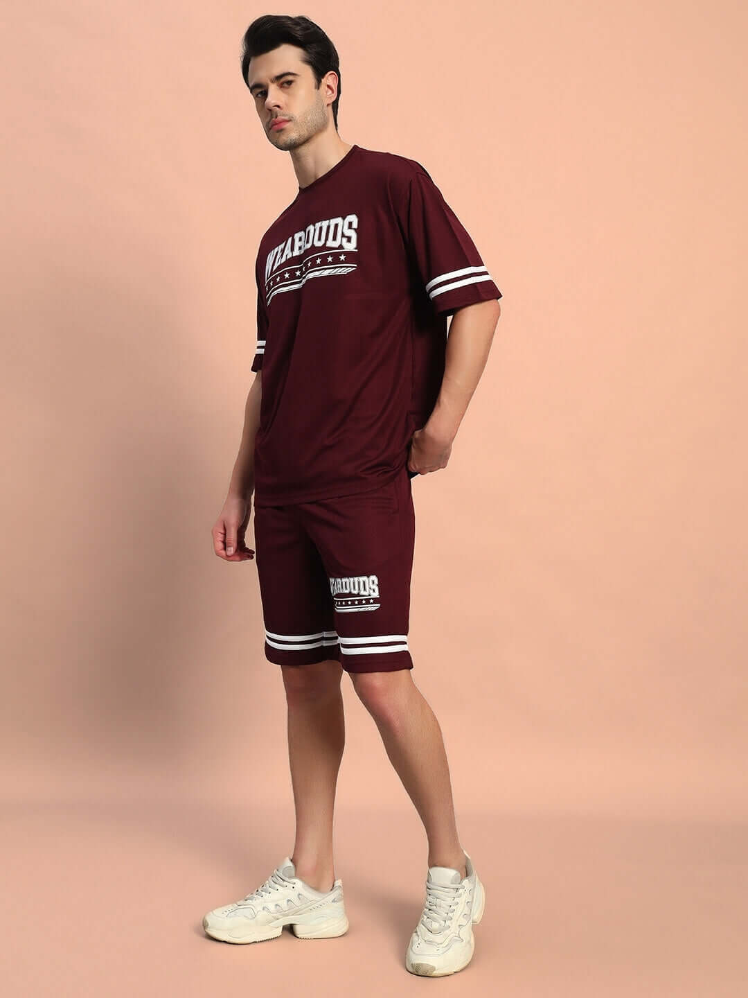 Model wearing GROOVY COLORBLOCK CO-ORD SET WINE, a retro-inspired outfit by WEAR DUDS, featuring a vibrant wine color and streetwear style.