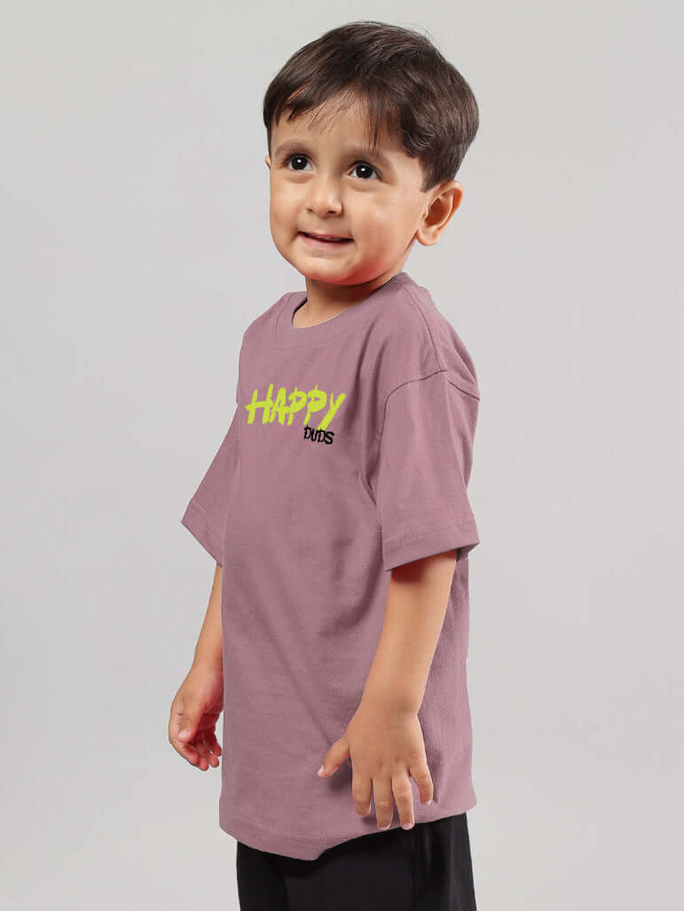 Child wearing a Happy Duds oversized t-shirt in Chinese violet, suitable for boys and girls, made-to-order with customization options.