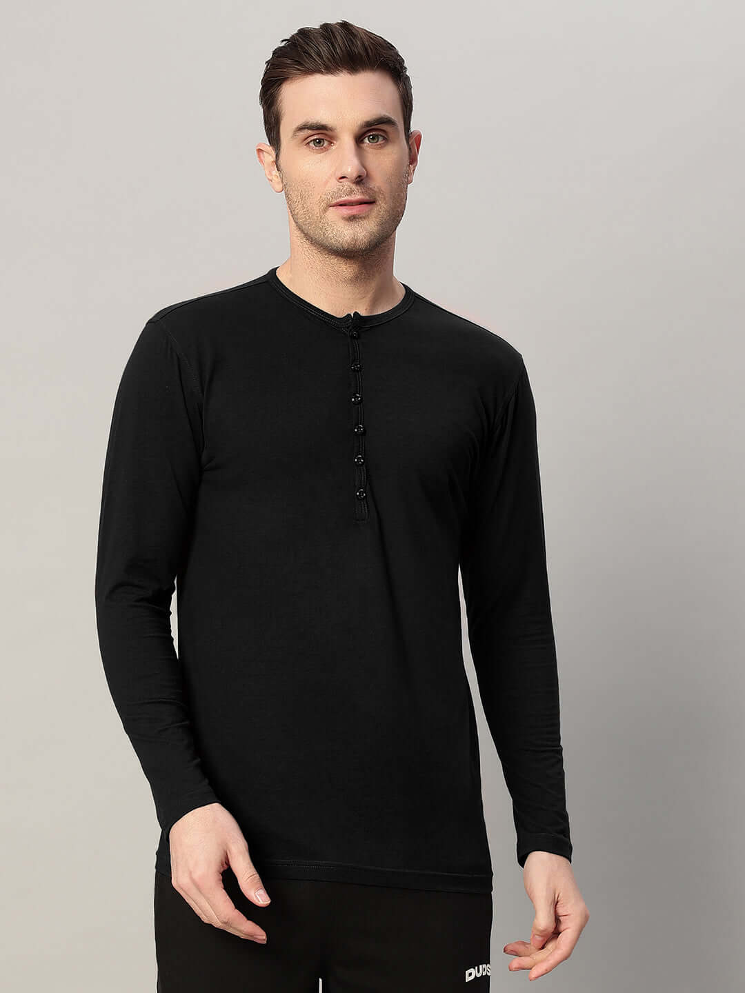 Henny Slim Fit Black Sweatshirt made from premium 100% cotton fabric, modeled by a person. Ideal for a stylish, casual look.