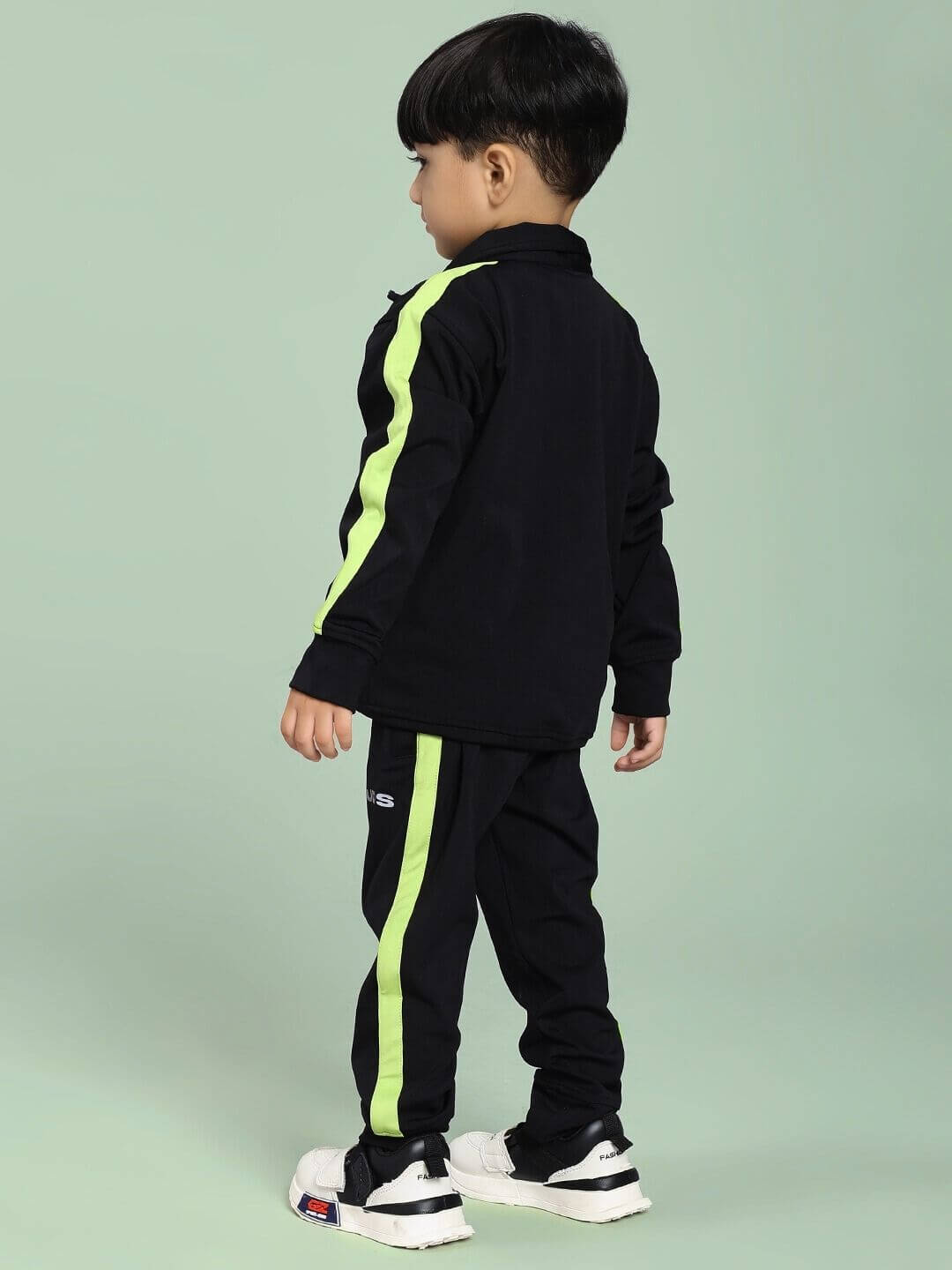 High performance co-ord set for boys and girls black outfit shown on a child, emphasizing style and comfort for active lifestyles.