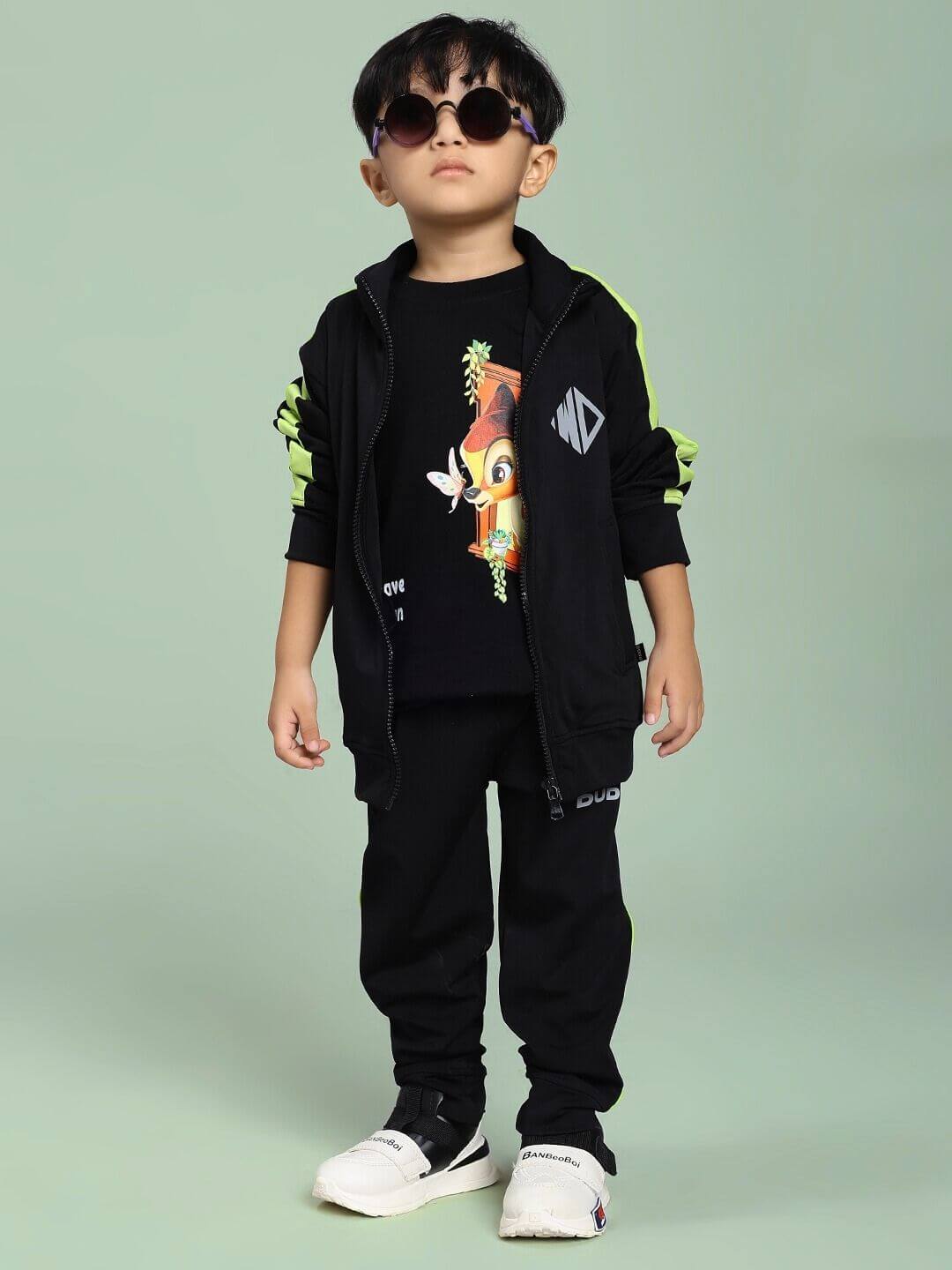 Child wearing HIGH PERFORMANCE CO-ORD SET FOR BOYS AND GIRLS BLACK, featuring a stylish unisex design perfect for active kids.