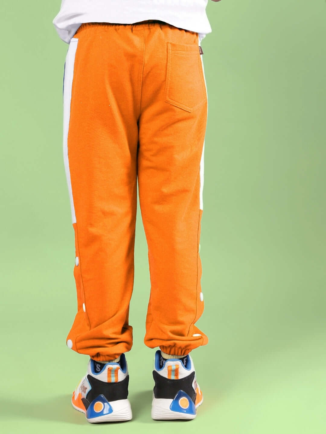 HIGH POINT JOGGER FOR BOYS & GIRLS ORANGE, made to order, side view.
