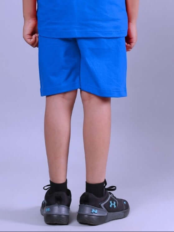 Child wearing HOLIDAY TIME RIDER PRINT SHORTS FOR BOYS AND GIRLS BLUE