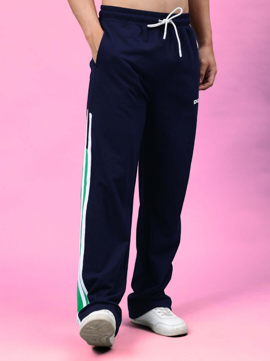 Hoofer Contrast Joggers in navy blue with green stripe detail shown on a model, emphasizing comfort and custom fit options from DUDS.