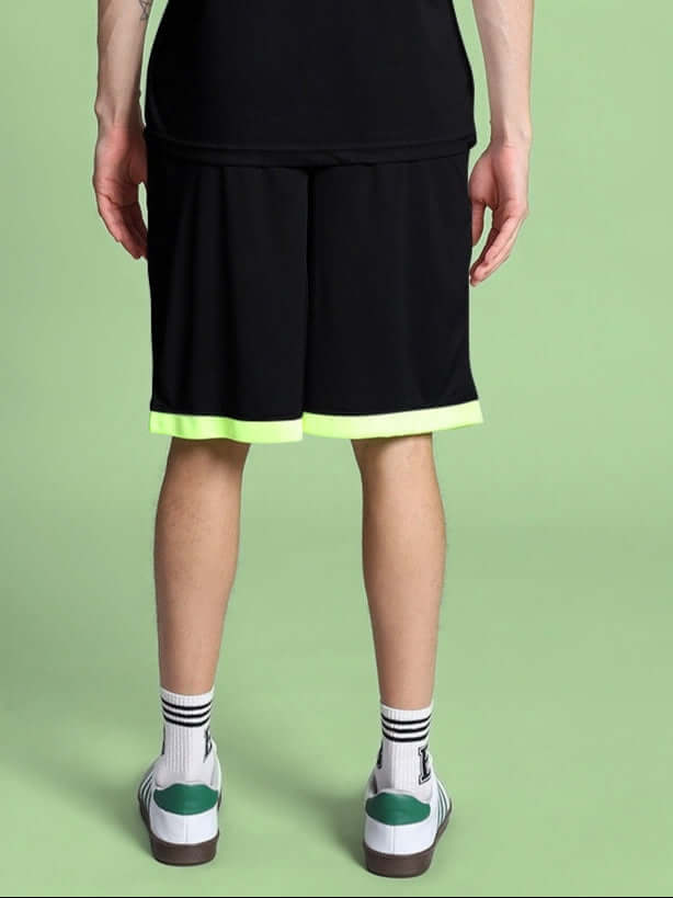 Rear view of HOOKUP REFLECTOR REGULAR FIT SHORTS BLACK with reflective trim, showcasing streetwear style.