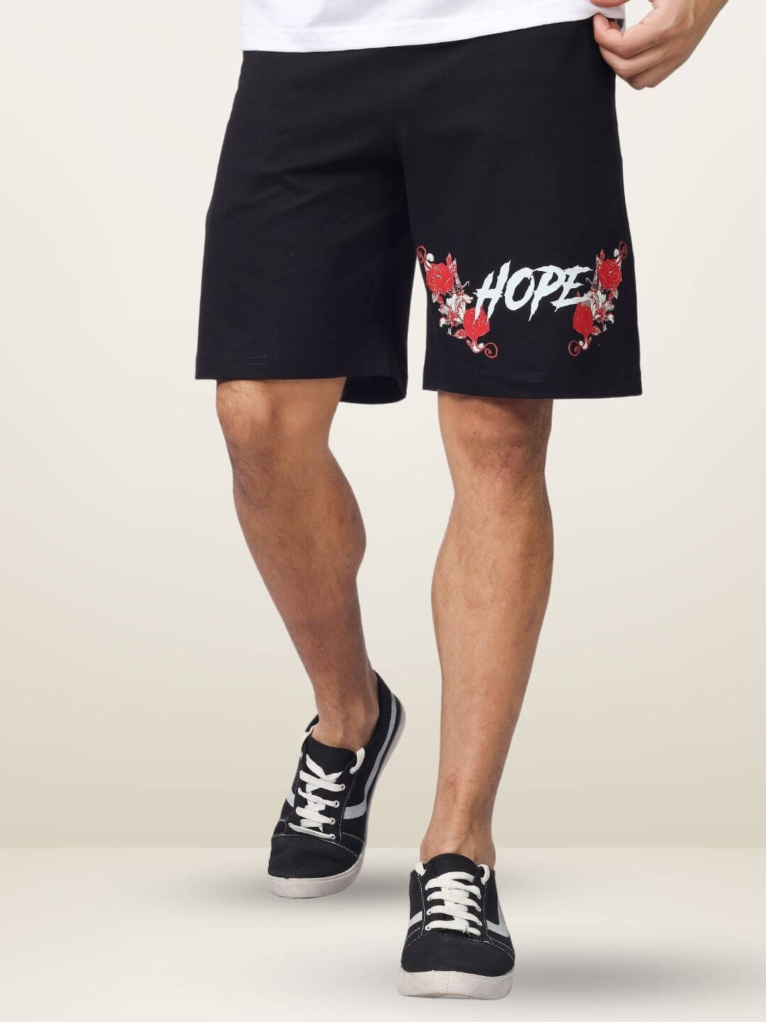 Man wearing HOPE regular fit black shorts with floral design, customizable sizing available, perfect for casual wear.