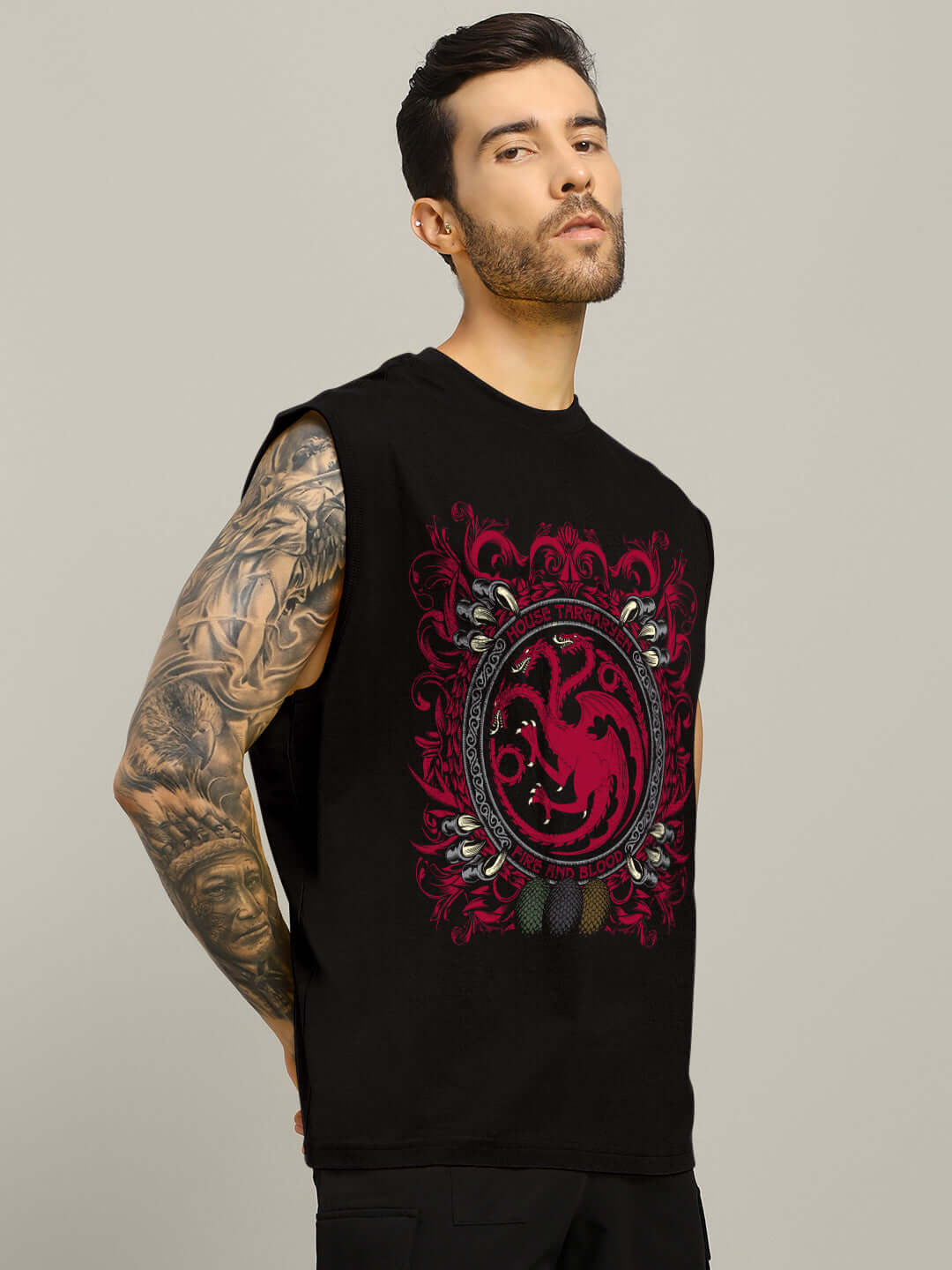Man wearing HOUSE OF DRAGON PRINTED GYM T-SHIRT BLACK with bold dragon graphic, showcasing sporty and fierce gym style.