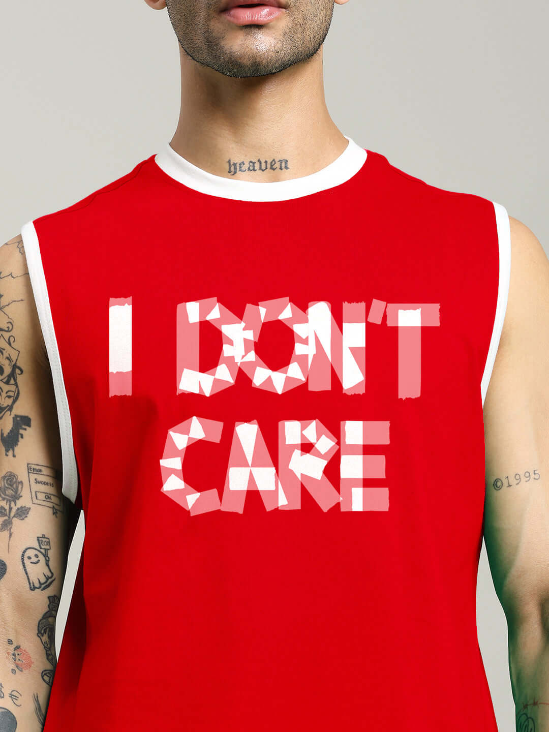 Red gym t-shirt with 'I DON'T CARE' text, offers customizable fit for prepaid orders, perfect for casual workout wear.