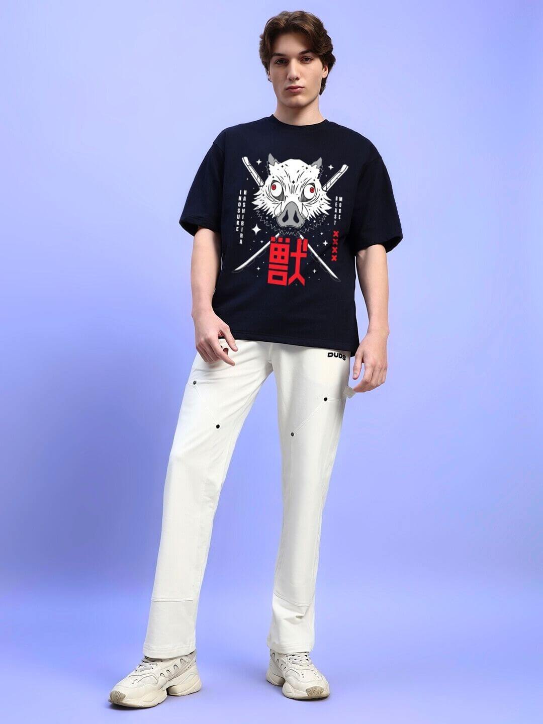 Model wearing INOSUKE PRINT OVERSIZED T-SHIRT BLACK, featuring Demon Slayer inspired design with bold graphic, paired with white pants.