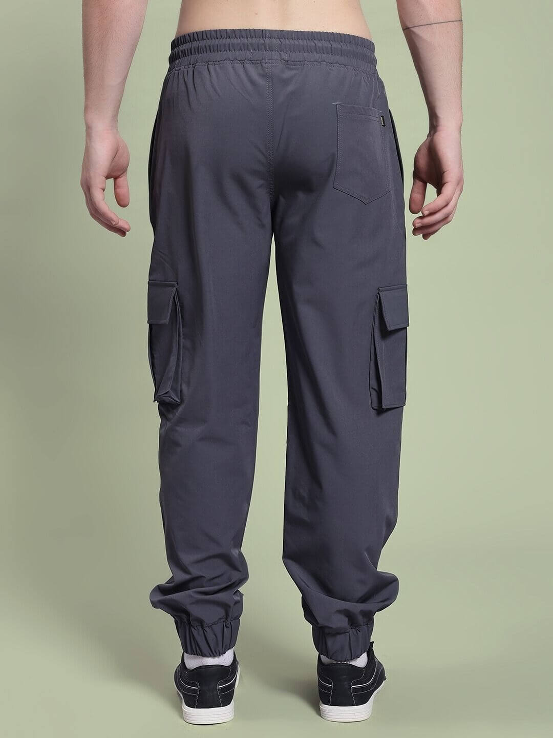 Back view of JACK RELAXED FIT MULTI POCKET CARGO DARK GREY showcasing relaxed fit and utility pockets for versatile style and comfort.