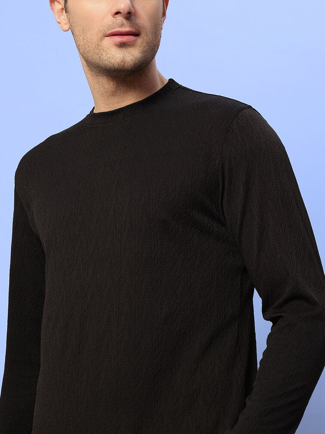 Model wearing black JACOB sweatshirt made from premium heavy gauge jacquard lycra fabric, suitable for cold machine wash.