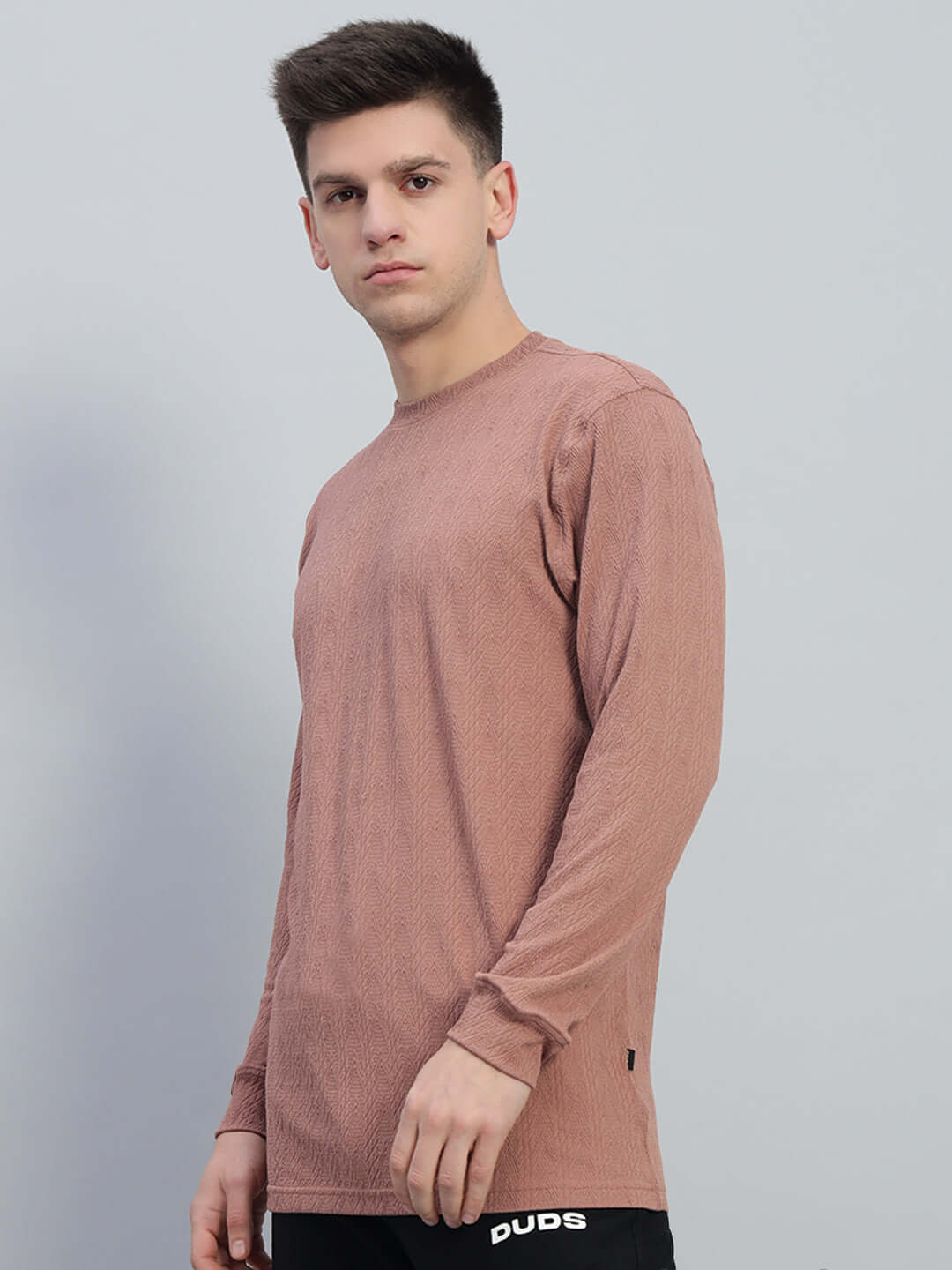 Man wearing a brown Jacob sweatshirt made of premium heavy gauge jacquard lycra fabric, ideal for stylish, comfortable wear.