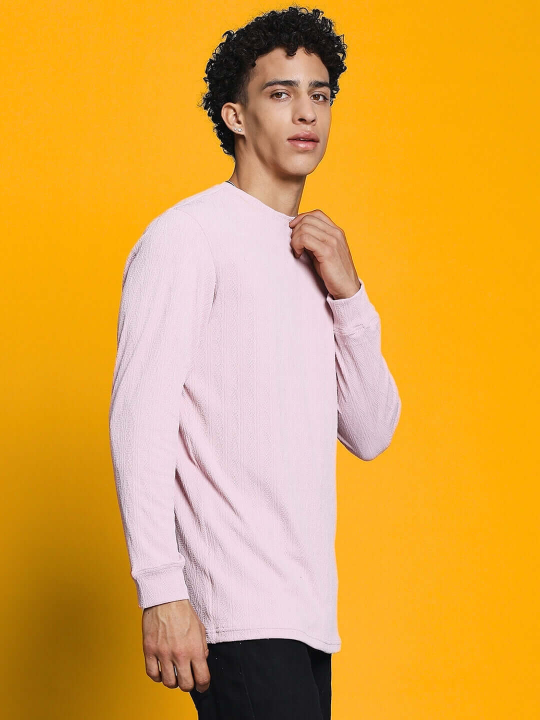 Model wearing pink JACOB SWEATSHIRT made from heavy gauge jacquard lycra fabric, ideal for casual wear. Cold machine wash recommended.