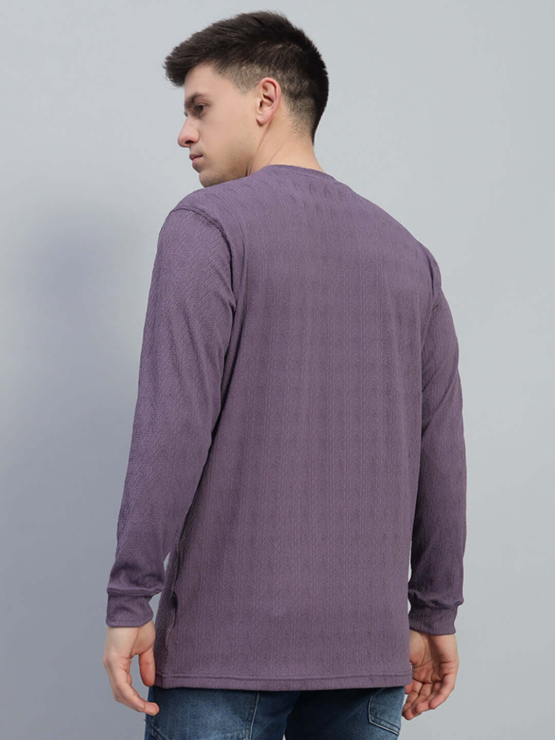 Back view of a man wearing a JACOB Purple Sweatshirt made from heavy gauge jacquard lycra fabric, ideal for casual wear.