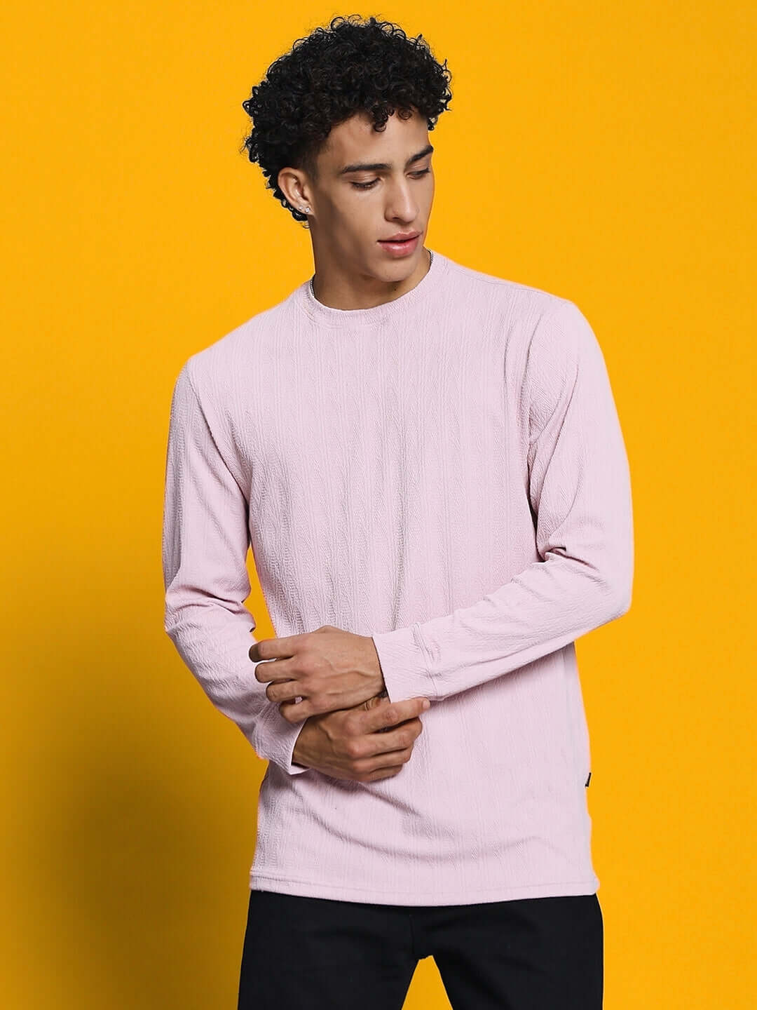 Model wearing JACOB Sweatshirt in pink, made from premium heavy gauge jacquard lycra, against a bright yellow background.