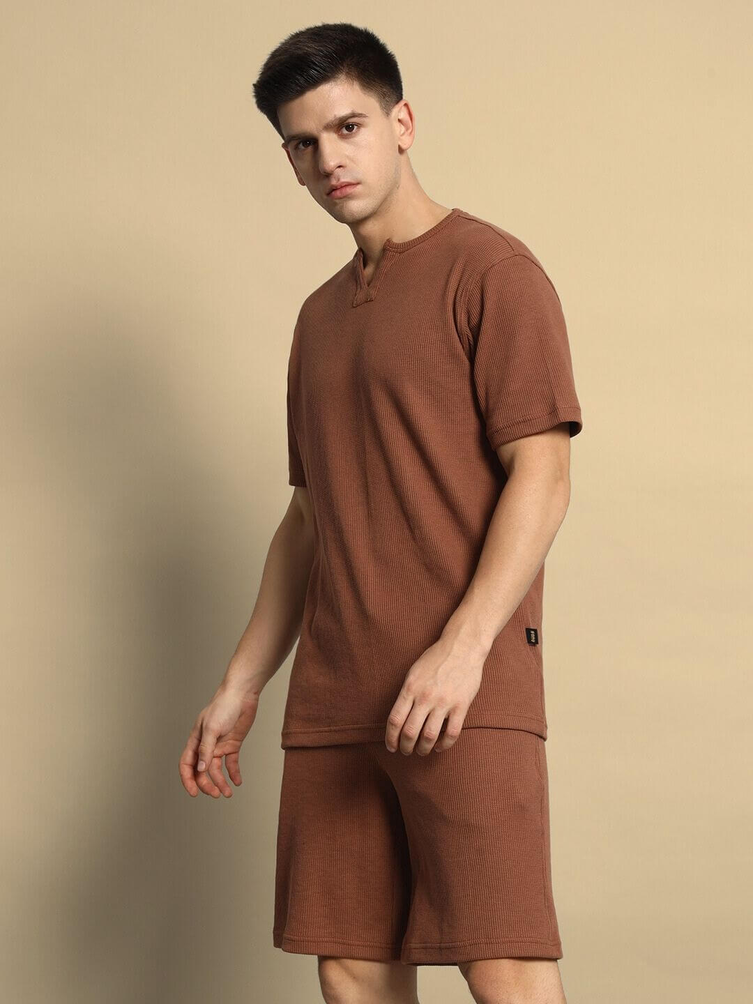 Model wearing Jagger Co-Ord Set in brown waffle fabric, relaxed fit, 100% cotton, made in India. Perfect for casual style. Cold wash care.