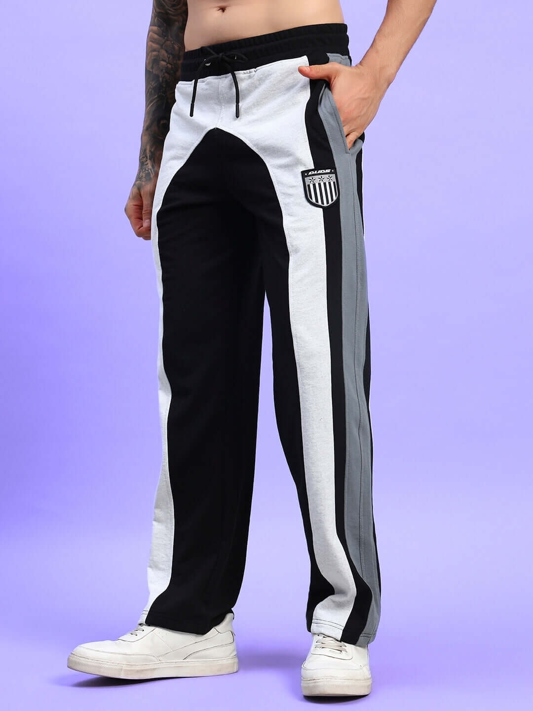 Men's Jamison color block relaxed-fit joggers in black melange-grey, showcasing casual style and comfort. Made to order by DUDS.